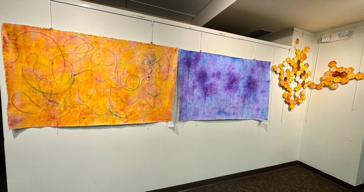 paintings and artwork from beeswax at exhibition